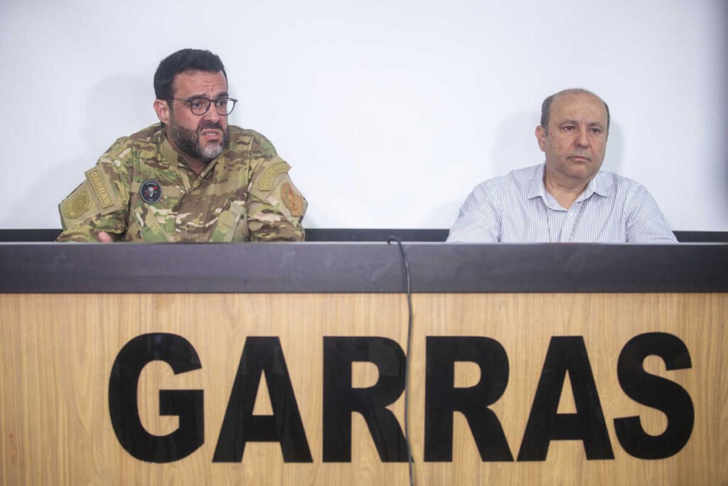 Membros do GARRAS durante pronunciamento oficial em coletiva de imprensa.