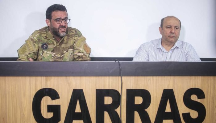 Membros do GARRAS durante pronunciamento oficial em coletiva de imprensa.