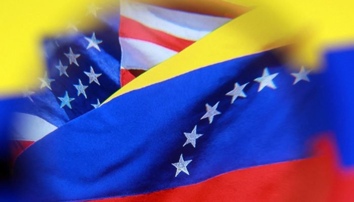 Ilustração mostra bandeiras dos EUA e da Venezuela — Foto: Ilustração mostra ban