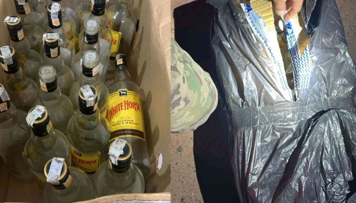 Na BR-262, flagrante de caminhão com garrafas para falsificar whisky