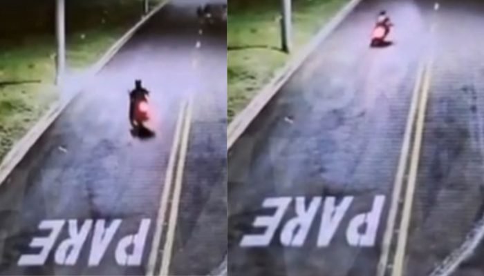 Suspeito deixando a delegacia. — Foto: Suspeito deixando a delegacia. (Foto: Leo