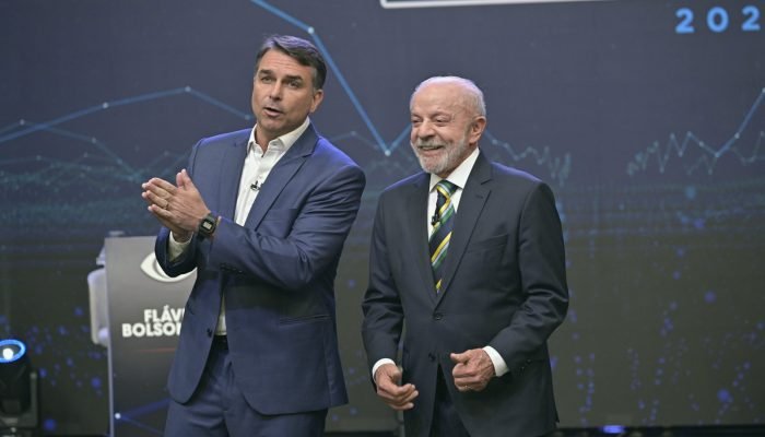 Flavio-Bolsonaro-e-Lula-no-Debate-da-Band-rf