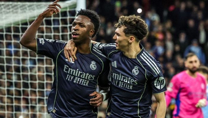 Vinicius Jr comemora durante partida do Real Madrid contra o Manchester City — F