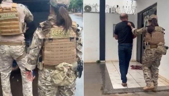 Agentes da DEFRON conduzindo um homem sob custódia.